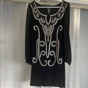 Elegant Black Dress with Sheer Sleeves and Silver Embellishments